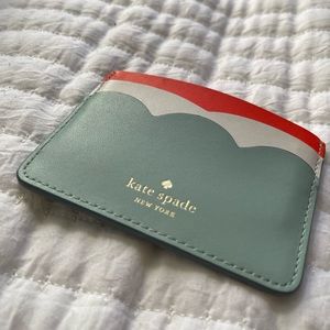 Cute Kate Spade card wallet NWOT! Never used. Three colors, pristine!
